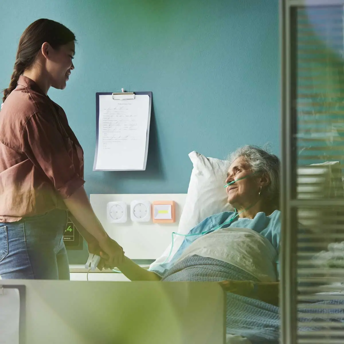 woman-talking-to-elderly-patient